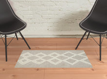 Gray And Ivory Wool Geometric Tufted Handmade Stain Resistant Area Rug - 4' X 6'