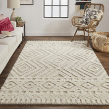 Ivory And Tan Wool Geometric Tufted Handmade Stain Resistant Area Rug - 4' x 6'