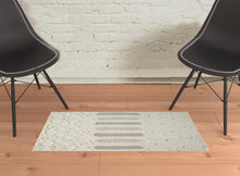 Ivory Taupe And Tan Wool Geometric Tufted Handmade Stain Resistant Area Rug - 4' x 6'