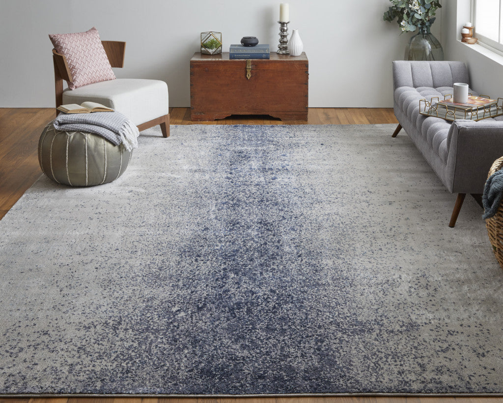 4' X 6' Ivory And Blue Abstract Power Loom Area Rug