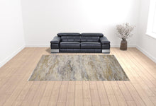 4' X 6' Gold Gray And Ivory Abstract Area Rug