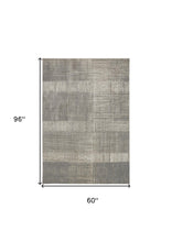 4' X 6' Gray And Ivory Abstract Area Rug