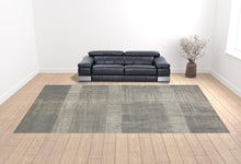 4' X 6' Gray And Ivory Abstract Area Rug