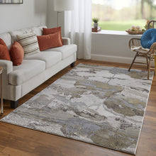 4' X 6' Gray Ivory And Gold Abstract Area Rug