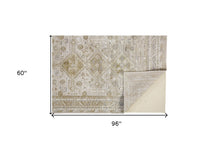 Gold And Ivory Floral Area Rug - 4' x 6'