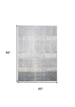 4' X 6' White Gray And Blue Abstract Area Rug