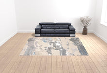 4' X 6' Ivory Gray And Blue Abstract Area Rug