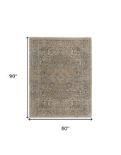 4' X 6' Brown Ivory And Tan Floral Power Loom Distressed Area Rug