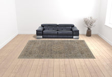 4' X 6' Brown Ivory And Tan Floral Power Loom Distressed Area Rug