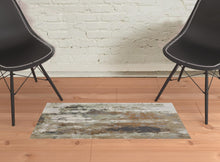 10' X 13' Blue Orange And Ivory Abstract Power Loom Area Rug