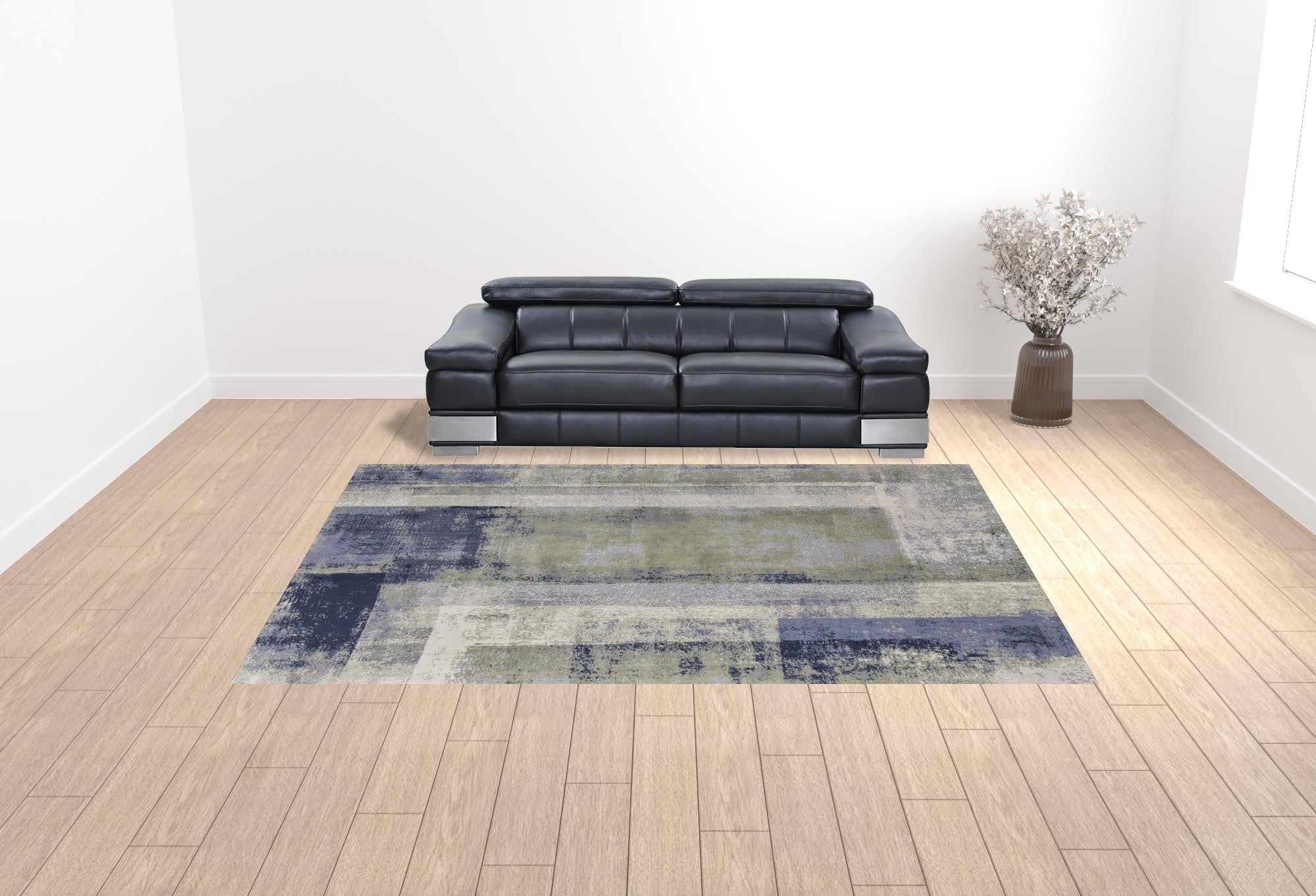4' X 6' Blue Green And Ivory Abstract Power Loom Distressed Area Rug