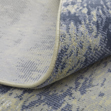 4' X 6' Blue Green And Ivory Abstract Power Loom Distressed Area Rug