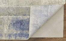 4' X 6' Blue Green And Ivory Abstract Power Loom Distressed Area Rug