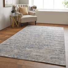 4' X 6' Blue And Ivory Abstract Power Loom Distressed Area Rug