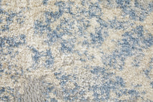 4' X 6' Blue And Ivory Abstract Power Loom Distressed Area Rug