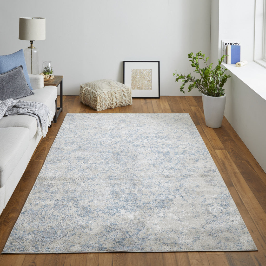 4' X 6' Blue And Ivory Abstract Power Loom Distressed Area Rug