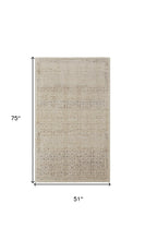 4' X 6' Ivory Tan And Gray Abstract Power Loom Distressed Area Rug