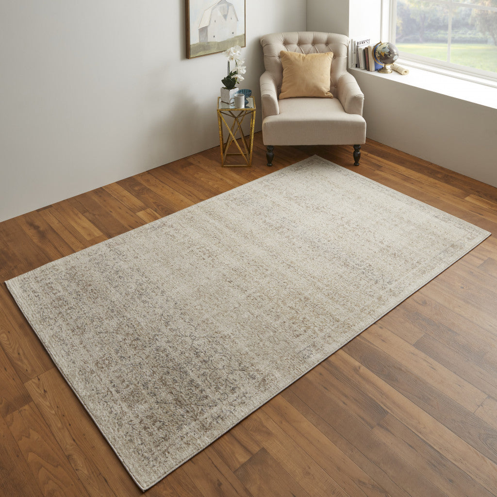 4' X 6' Ivory Tan And Gray Abstract Power Loom Distressed Area Rug