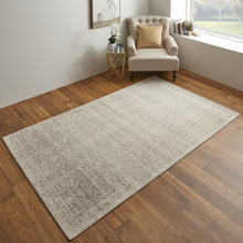 4' X 6' Ivory Tan And Gray Abstract Power Loom Distressed Area Rug