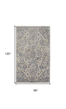 4' X 6' Blue Gray And Ivory Floral Power Loom Distressed Area Rug
