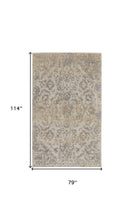 4' X 6' Blue Gray And Ivory Floral Power Loom Distressed Area Rug