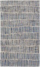 5' X 8' Blue And Ivory Geometric Power Loom Distressed Area Rug