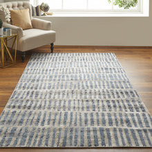 5' X 8' Blue And Ivory Geometric Power Loom Distressed Area Rug