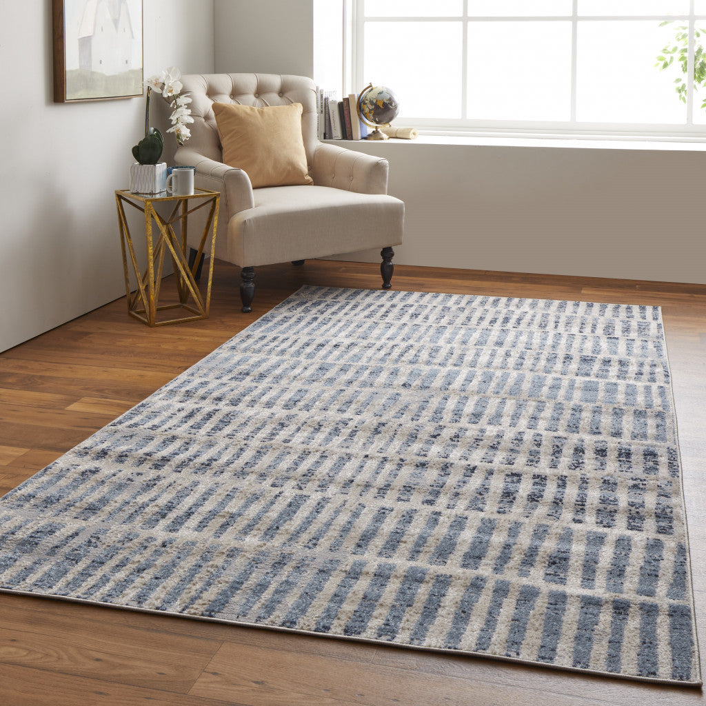 5' X 8' Blue And Ivory Geometric Power Loom Distressed Area Rug
