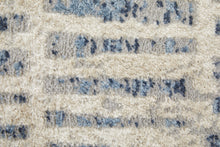 5' X 8' Blue And Ivory Geometric Power Loom Distressed Area Rug