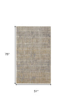 5' X 8' Blue And Ivory Geometric Power Loom Distressed Area Rug