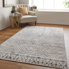 4' X 6' Ivory Blue And Gray Geometric Power Loom Distressed Area Rug