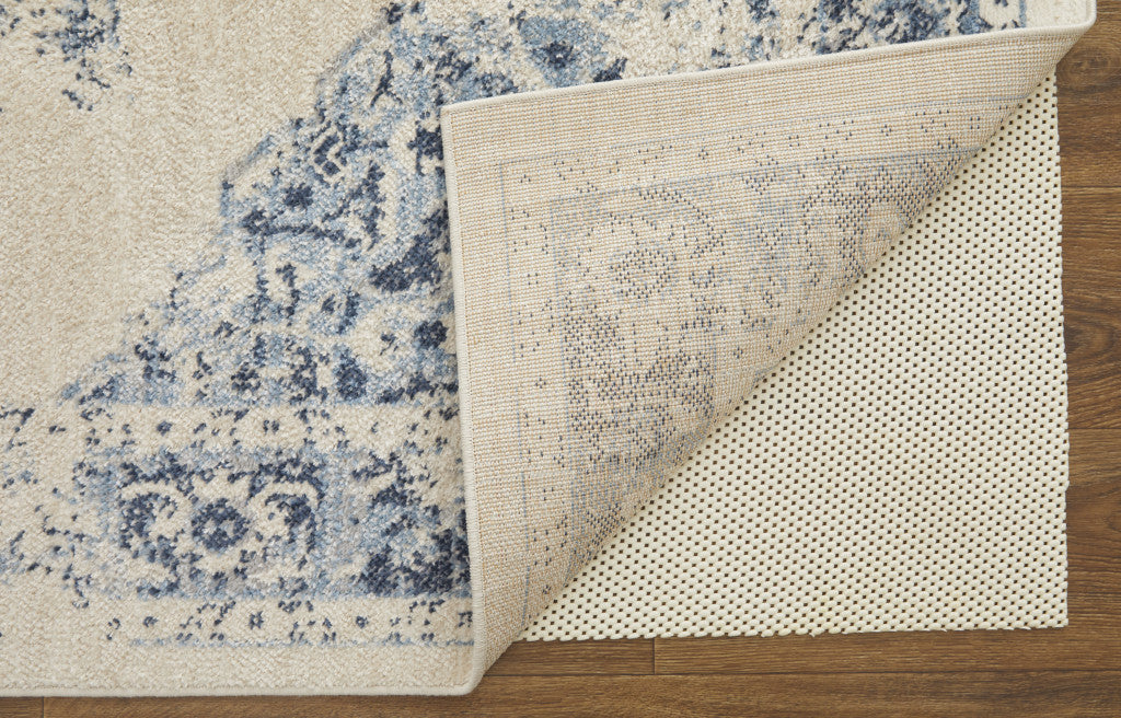 4' X 6' Ivory And Blue Floral Power Loom Distressed Area Rug