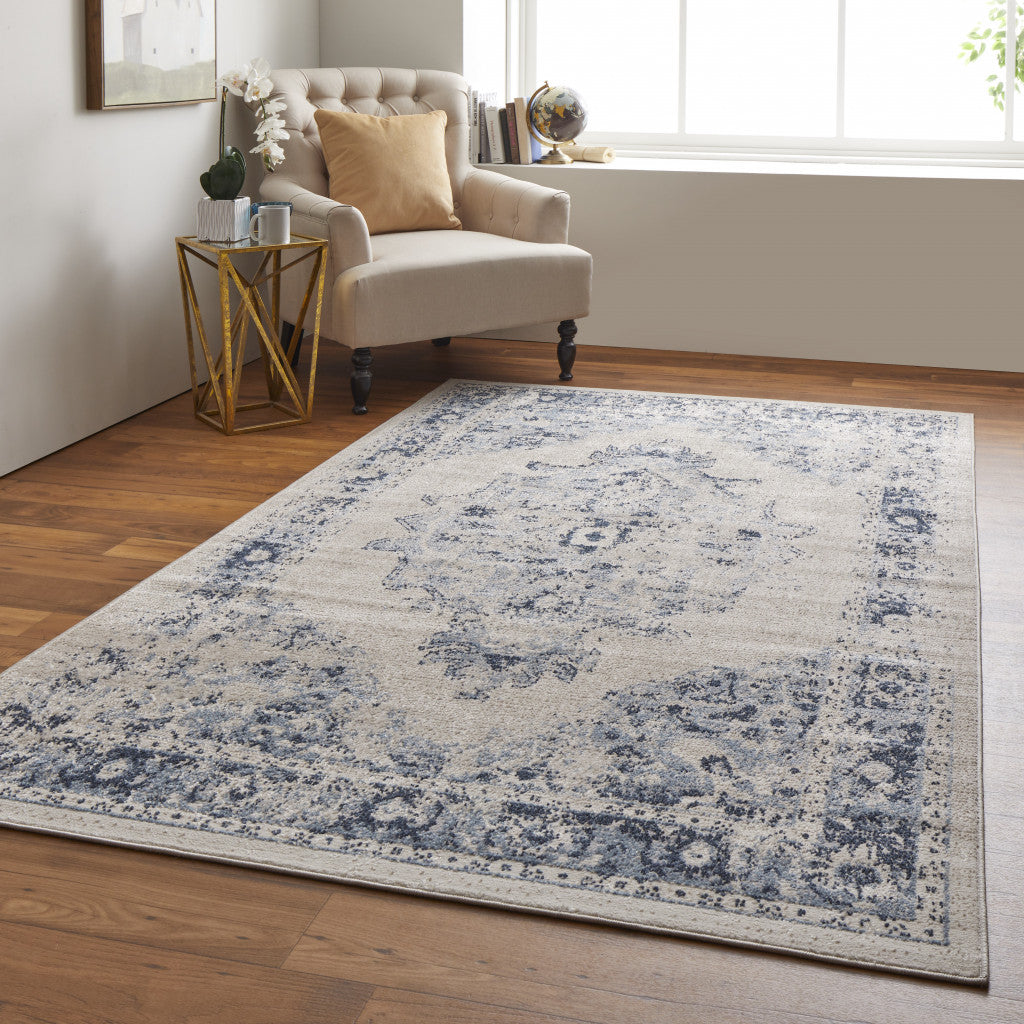4' X 6' Ivory And Blue Floral Power Loom Distressed Area Rug