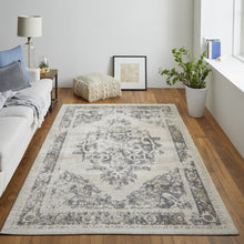 4' X 6' Ivory And Blue Floral Power Loom Distressed Area Rug
