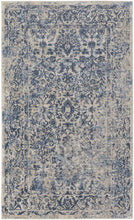 4' X 6' Blue And Ivory Floral Power Loom Distressed Area Rug