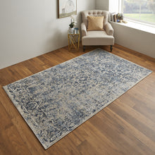 4' X 6' Blue And Ivory Floral Power Loom Distressed Area Rug