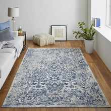 4' X 6' Blue And Ivory Floral Power Loom Distressed Area Rug