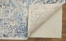 4' X 6' Blue And Ivory Floral Power Loom Distressed Area Rug