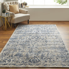 4' X 6' Blue And Ivory Floral Power Loom Distressed Area Rug
