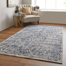 4' X 6' Blue And Ivory Floral Power Loom Distressed Area Rug