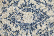4' X 6' Blue And Ivory Floral Power Loom Distressed Area Rug