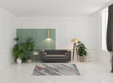 3' X 5' Ivory Orange And Blue Abstract Power Loom Stain Resistant Area Rug