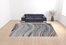 3' X 5' Blue Gray And Orange Abstract Power Loom Stain Resistant Area Rug