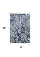 3' X 5' Blue And Ivory Abstract Power Loom Distressed Stain Resistant Area Rug