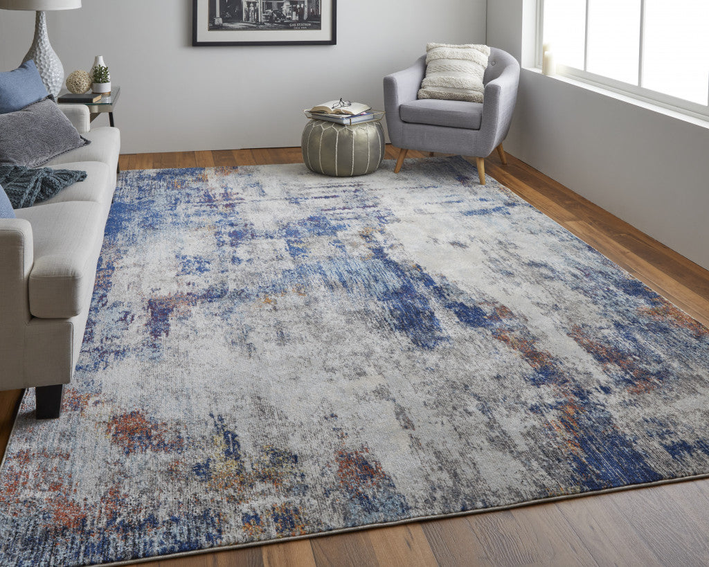 3' X 5' Ivory And Blue Abstract Power Loom Distressed Stain Resistant Area Rug