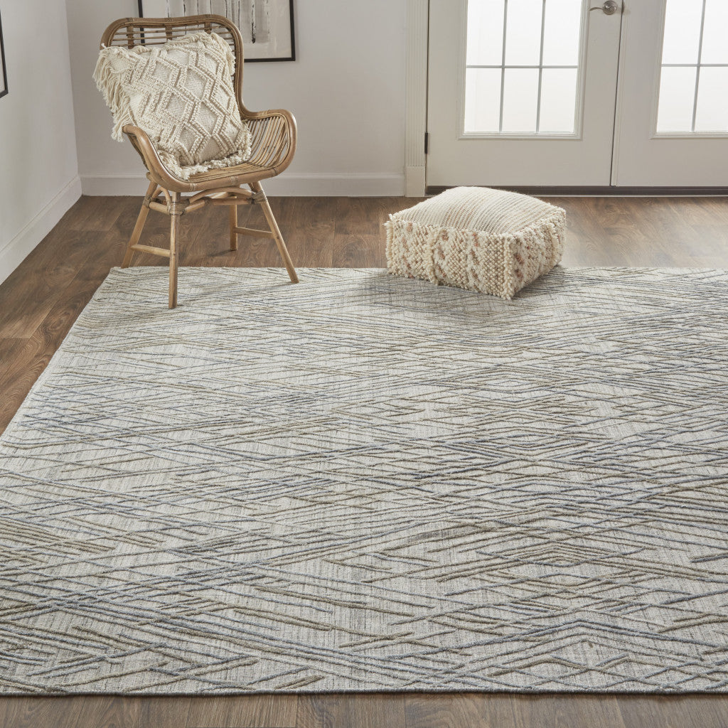 5' X 8' Gray And Ivory Abstract Hand Woven Area Rug