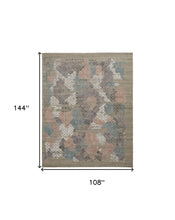 4' X 6' Pink Blue And Taupe Abstract Hand Woven Distressed Area Rug
