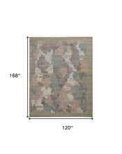 4' X 6' Pink Blue And Taupe Abstract Hand Woven Distressed Area Rug