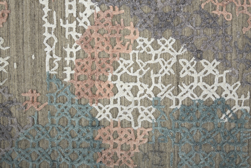 4' X 6' Pink Blue And Taupe Abstract Hand Woven Distressed Area Rug