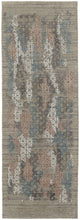 4' X 6' Pink Blue And Taupe Abstract Hand Woven Distressed Area Rug